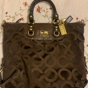 Coach handbag with brown wallet included.